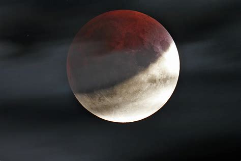 Half red Moon eclipse Photograph by Lukasz Sujka - Pixels