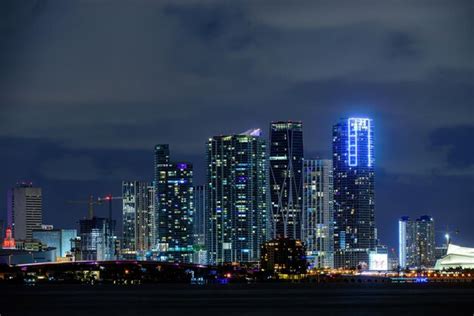 Premium Photo | Miami city night skyline city miami lighting lights sea ...