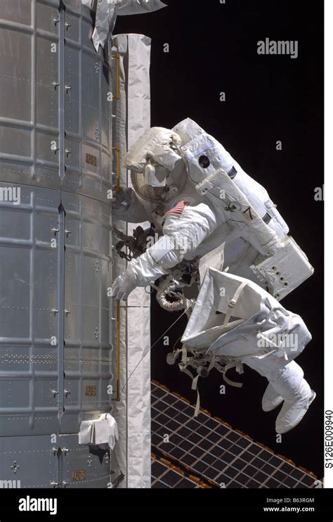 Astronaut Steve Bowen Complets The Lubrication Of The Port Solar Alpha