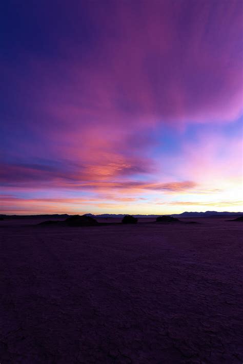 Sunset Over the Playa Photograph by Melanie Lawson - Pixels