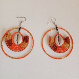 ON SALE Cowrie Sea Shell Earrings Orange African Beaded Earrings