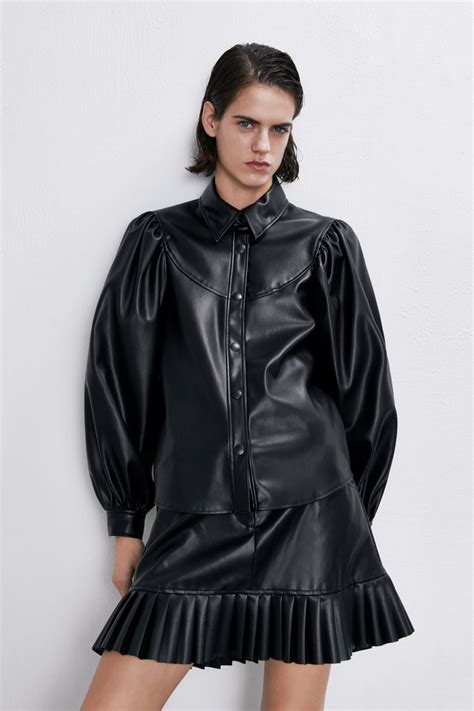 РУБАШКА ИЗ ИСКУССТВЕННОЙ КОЖИ С ЗАСТЕЖКОЙ НА ПУГОВИЦЫ - Просмотреть все ...