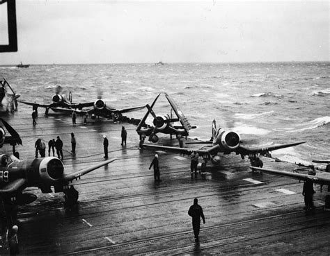 Asisbiz Vought F4U 1D Corsair VF 84 White 123 And 99 Preparing For