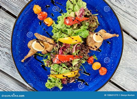 Arrangement Of Vegetable Salad On Blue Plate Stock Image Image Of