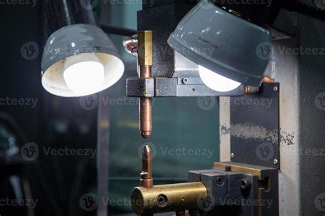 close-up view of spot welder tips device with two lamps 12634920 Stock Photo at Vecteezy