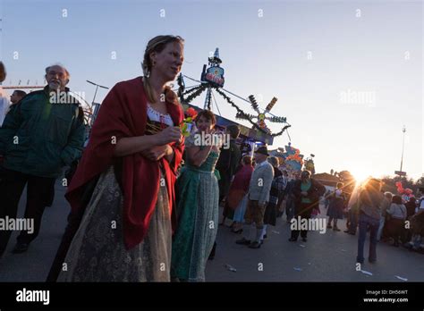 A woman wearing traditional Bavarian clothes. The world's largest beer ...