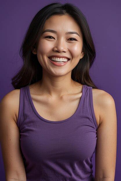 Premium Photo Asian Woman Wearing Purple Tank Top Smiling On Purple