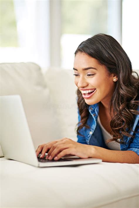 Woman Laptop And Smile For Good News On Sofa Reading Email Blog Or