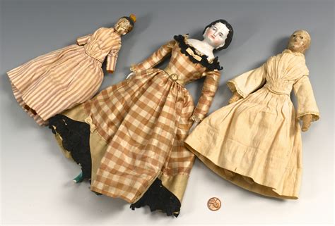 Lot 851 19th Century Dolls 1 Porcelain 2 Wood Case Auctions