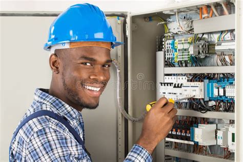 African Electrical Engineer Using Laptop Stock Photo Image Of