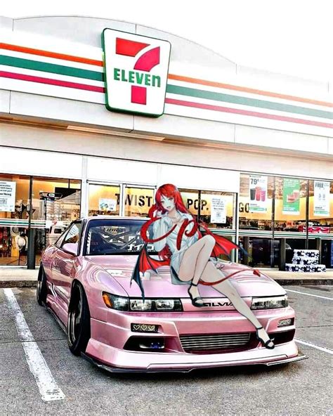 A Pink Car Parked In Front Of A Store With A Woman Sitting On The Hood