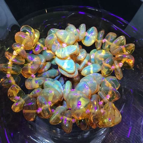  Gems That Fluoresce: A Radiant Symphony of Color Under UV Light 