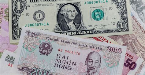 1 USD = 23,135 VND