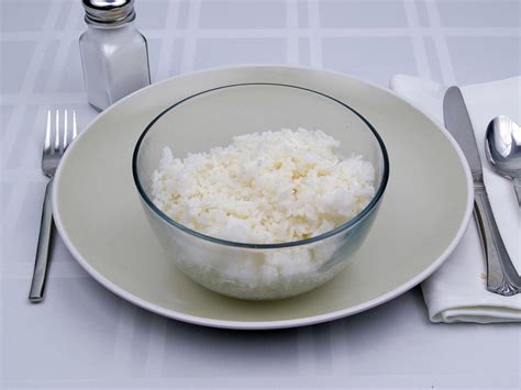 1 serving of cooked rice is about 1/2 cup (120g).