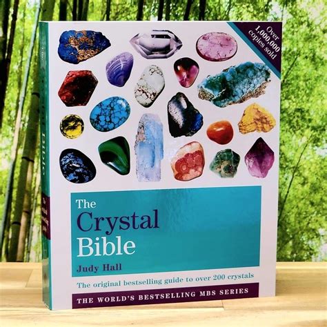 1. "The Crystal Bible: A Definitive Guide to 800 Crystals" by Judy Hall