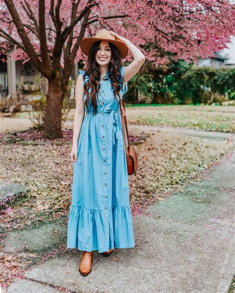 1. Denim Maxi Dress with Cowboy Boots