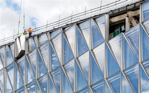 1. Glass and Steel Facade: