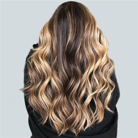 1. Golden Blonde Balayage on Chocolate Brown Hair