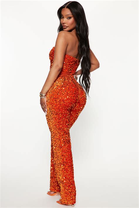 1. Intricate Orange Jumpsuit: