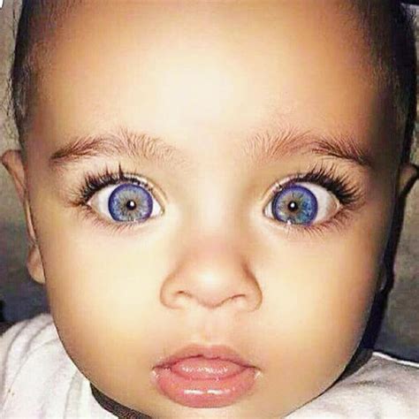 1. Large Eyes and Baby-Like Features: