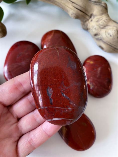 1. Red Jasper: Grounding and Protection (Root Chakra)