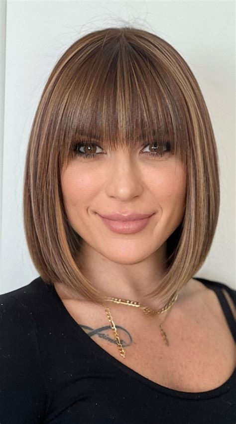 1. Sleek Bob with Rounded Bangs