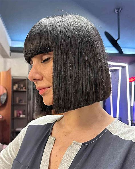 1. Sleek and Chic Bob with Blunt Bangs