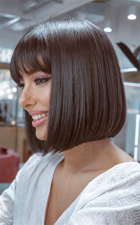 1. Sleek and Sophisticated: Bob with Blunt Bangs