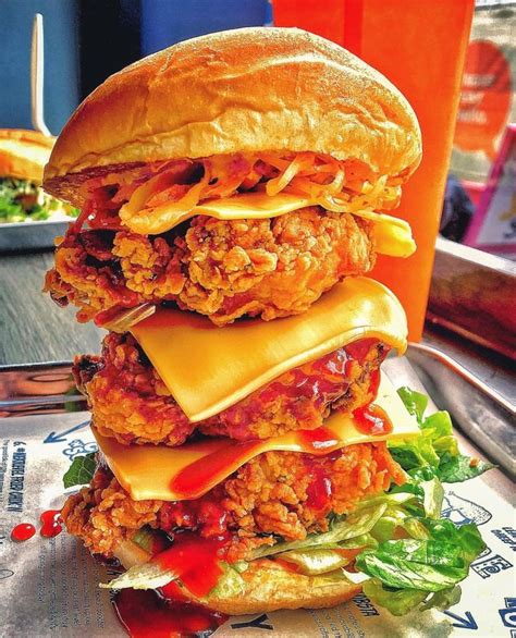 1. Triple Chicken Burger: The Heroic Feast!