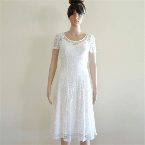 1. White Lace Dress with Cap Sleeves