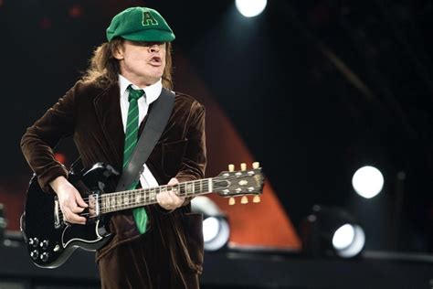 10,000-Word Deep Dive into Angus Young, the Legendary AC/DC Guitarist