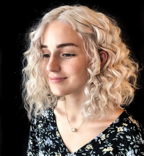 10 Platinum Blonde Curly Hair Looks to Inspire Your Next Salon Visit