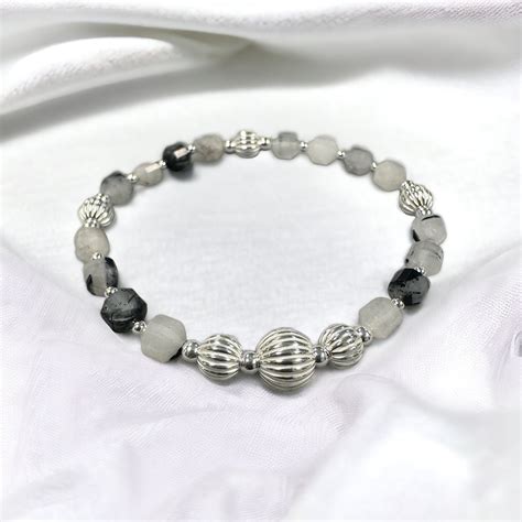 15 Beaded Bracelets Crystal: Radiance, Elegance, and Meaning