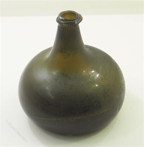 17th Century Green Glass Footed Bottle: A Treasure Trove of History