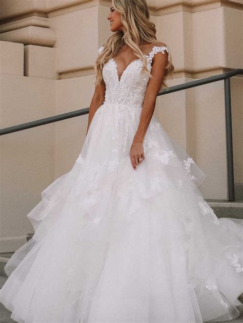 23 Ruffle Wedding Dresses That Will Make You Feel Like a Princess