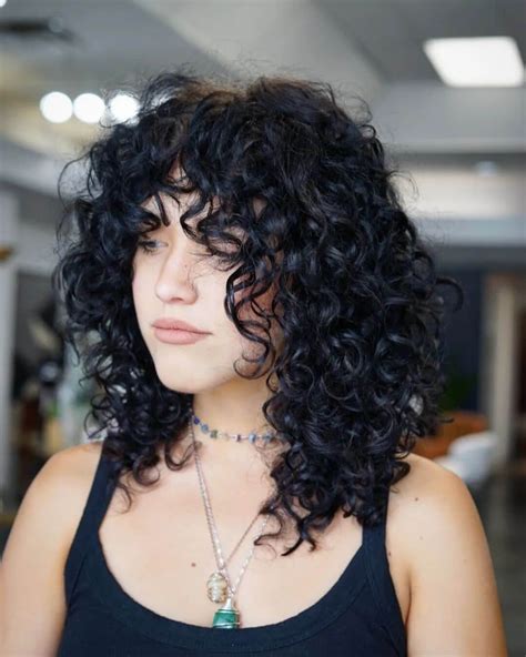 31 Sizzling Curly Wolf Cuts for a Wildly Chic Look