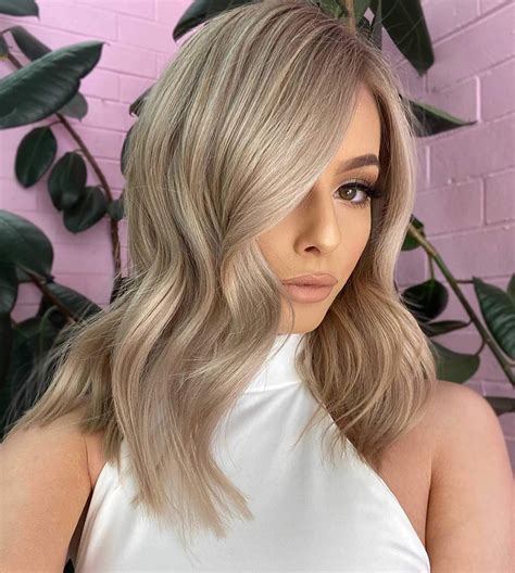 6 Enchanting Medium Ash Blonde Hair Designs to Light Up Your Aura