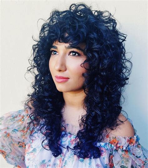 7 Captivating Curly Wolf Cuts for a Bold & Edgy Style