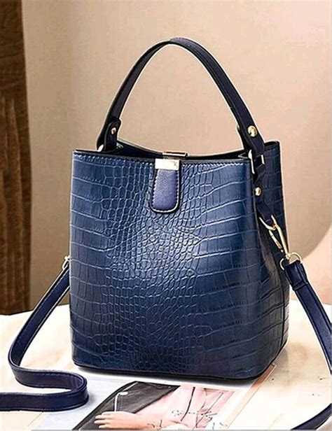 A Comprehensive Guide to Finding, Styling, and Caring for Navy Blue Leather Handbags