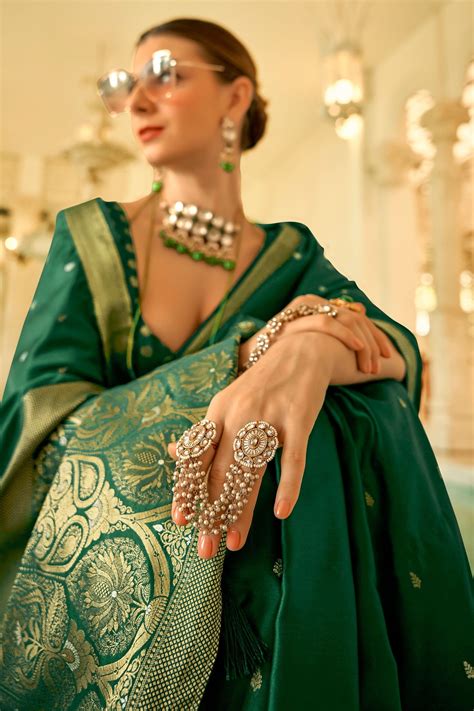 A Guide to Enhancing the Charm of a Green Saree with Exquisite Jewellery