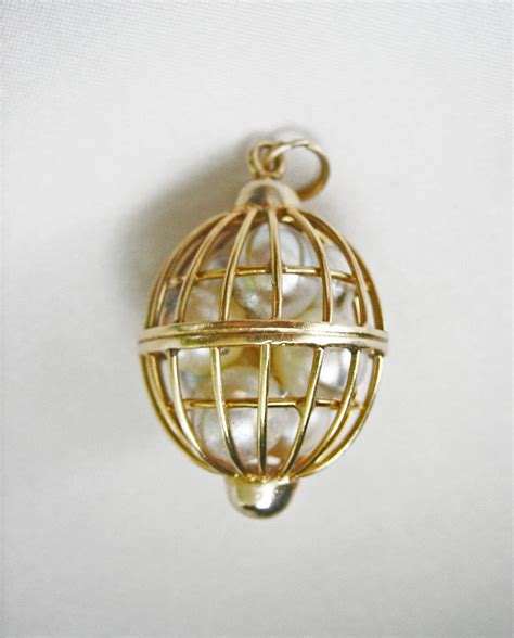 A Historical Perspective on Cage Pendants