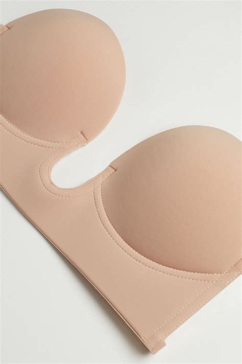 Adhesive bras: