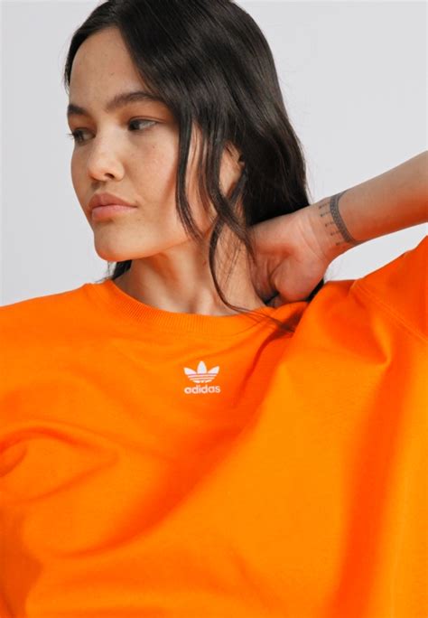 Adidas Orange Shirt: A Symbol of Style and Performance