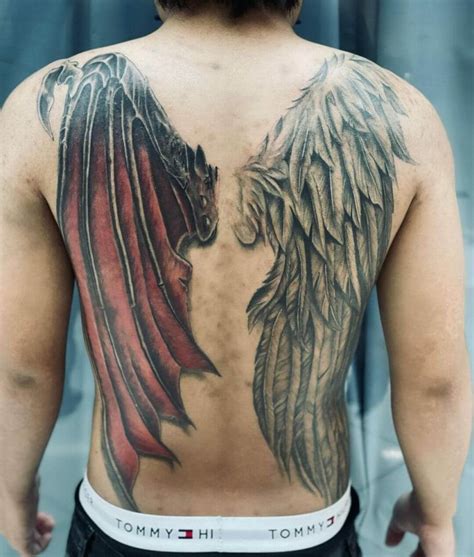 Angelic Allure or Devilish Delight: Exploring the Intriguing Symbolism of Angel Devil Wings Tattoos