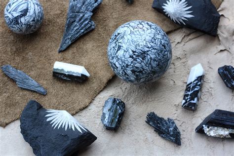 Black and White Crystals: A Tale of Two Energies