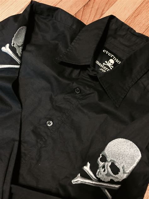 Black skull button up shirt: