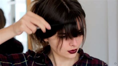 Blow dry bangs in the direction you want them to fall.