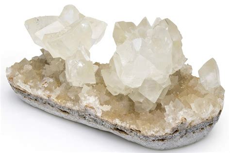 Calcite Cluster: A Crystal of Abundance, Growth, and Transformation