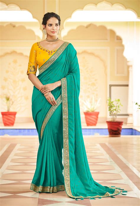 Captivate the Crowd in a Breathtaking Firozi Colour Saree