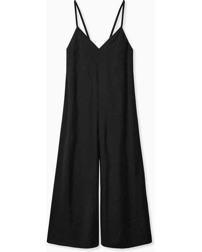 Captivate the Night with the Enigma of a Chic COS Black Jumpsuit